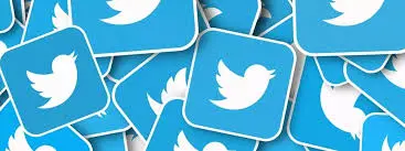 Multiple blue squares feature the white Twitter Influencers bird logo in a scattered pattern, conveying themes of social media connectivity and communication.